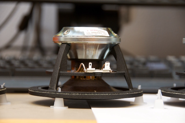 A Scanspeak Illuminator midrange used in the Beolab 90. It's upside down here, but its easy to see the relatively large size of the magnetic housing in which the voice coil moves.